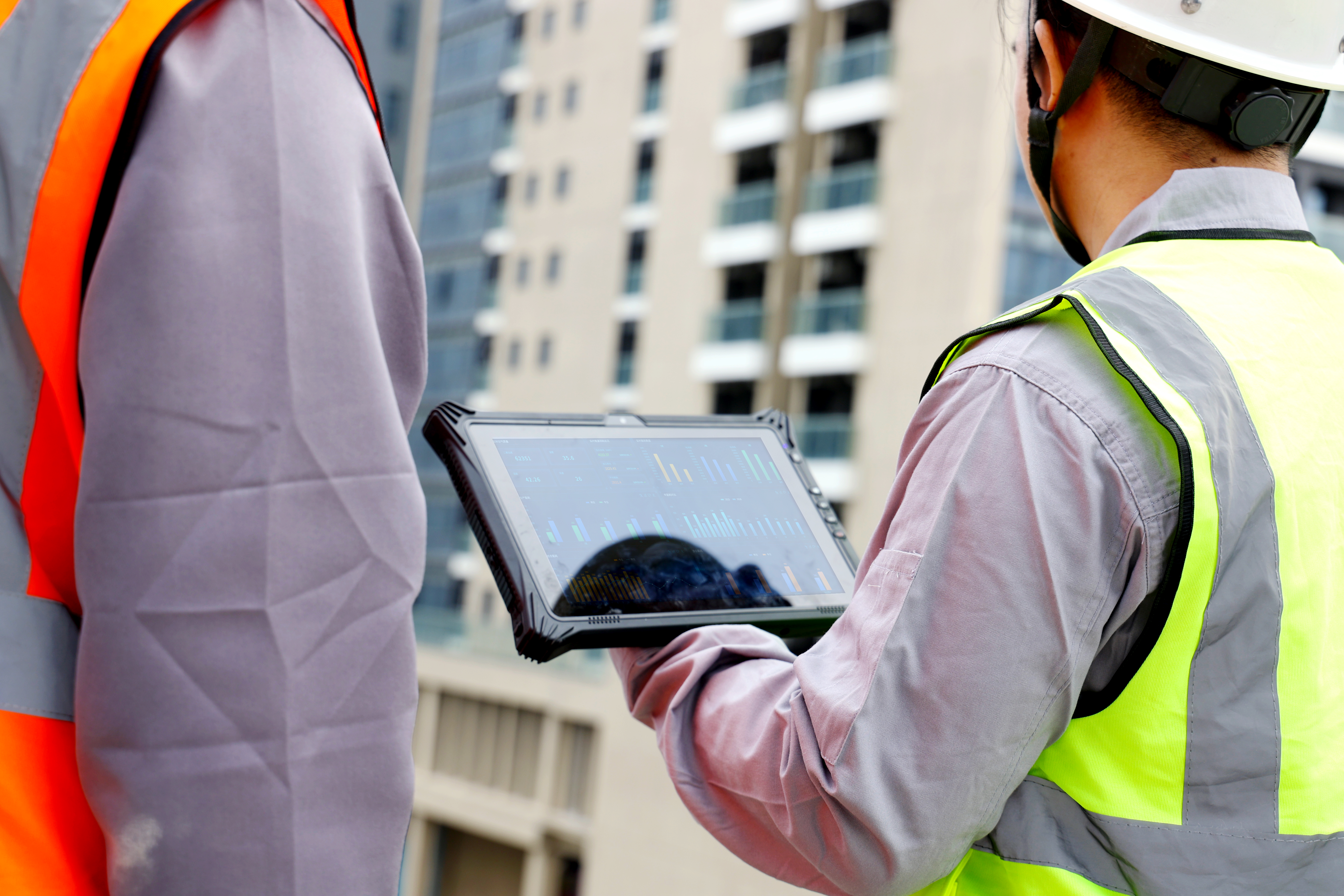 Industrial worker holding ONERugged M10N tablet